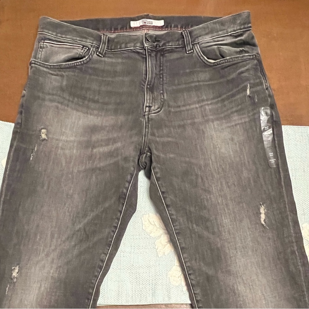 Brand: Tommy Hilfiger gray wash jeans never worn.